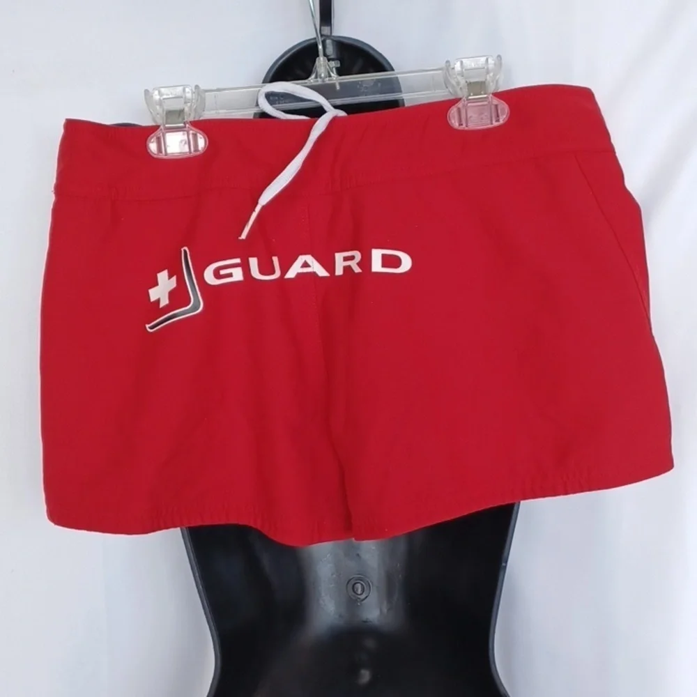Red Nike swim shorts, Jr size medium